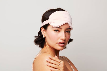 Model wearing 100% pure mulberry silk eye mask in pink